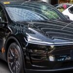 Black Tesla Model Y L electric SUV